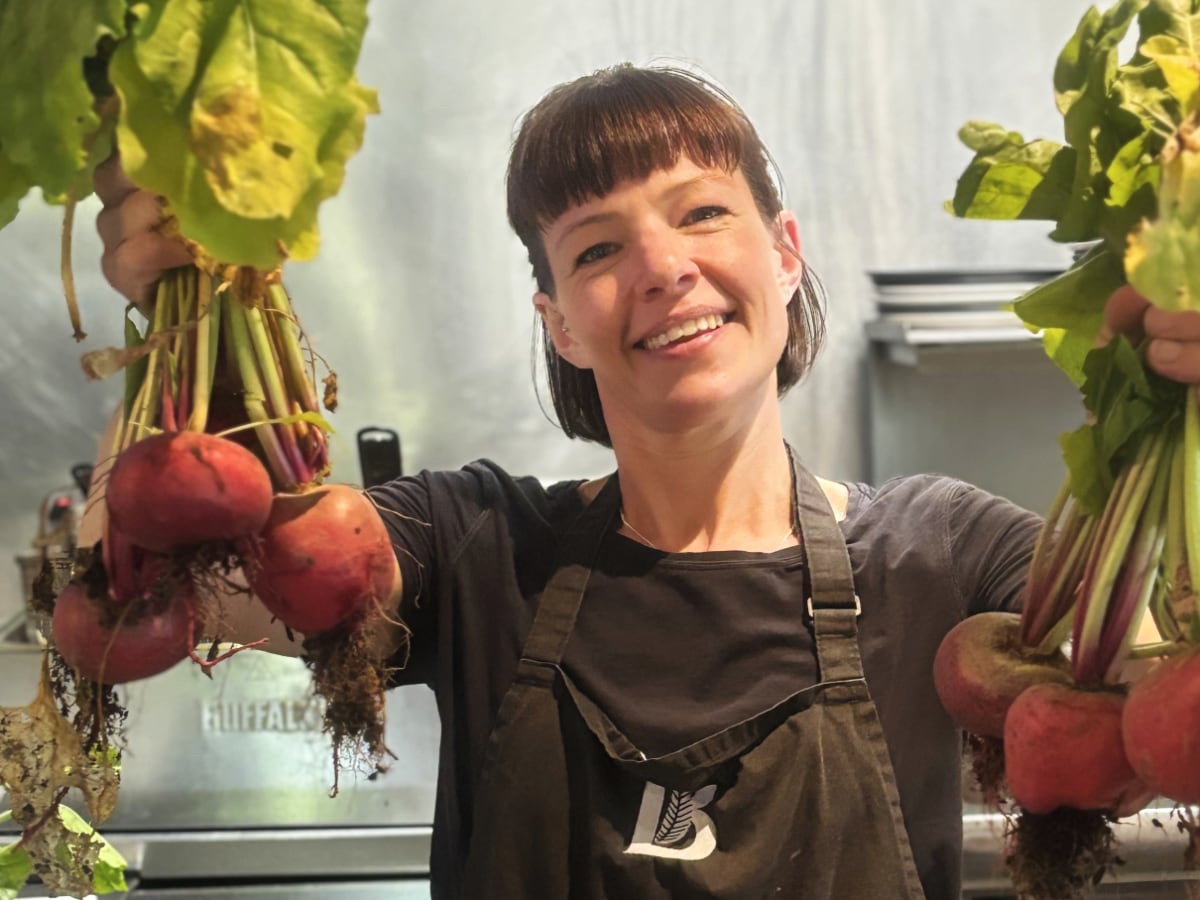 Flick holding beetroot.