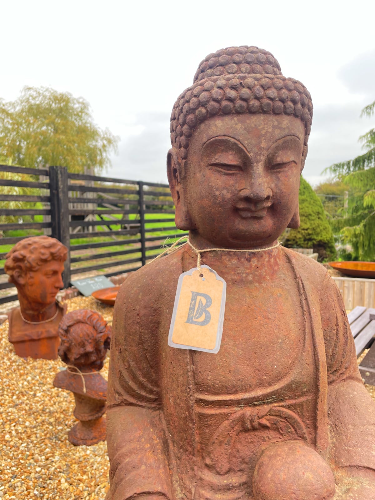 The steel Buddha with David in the background.
