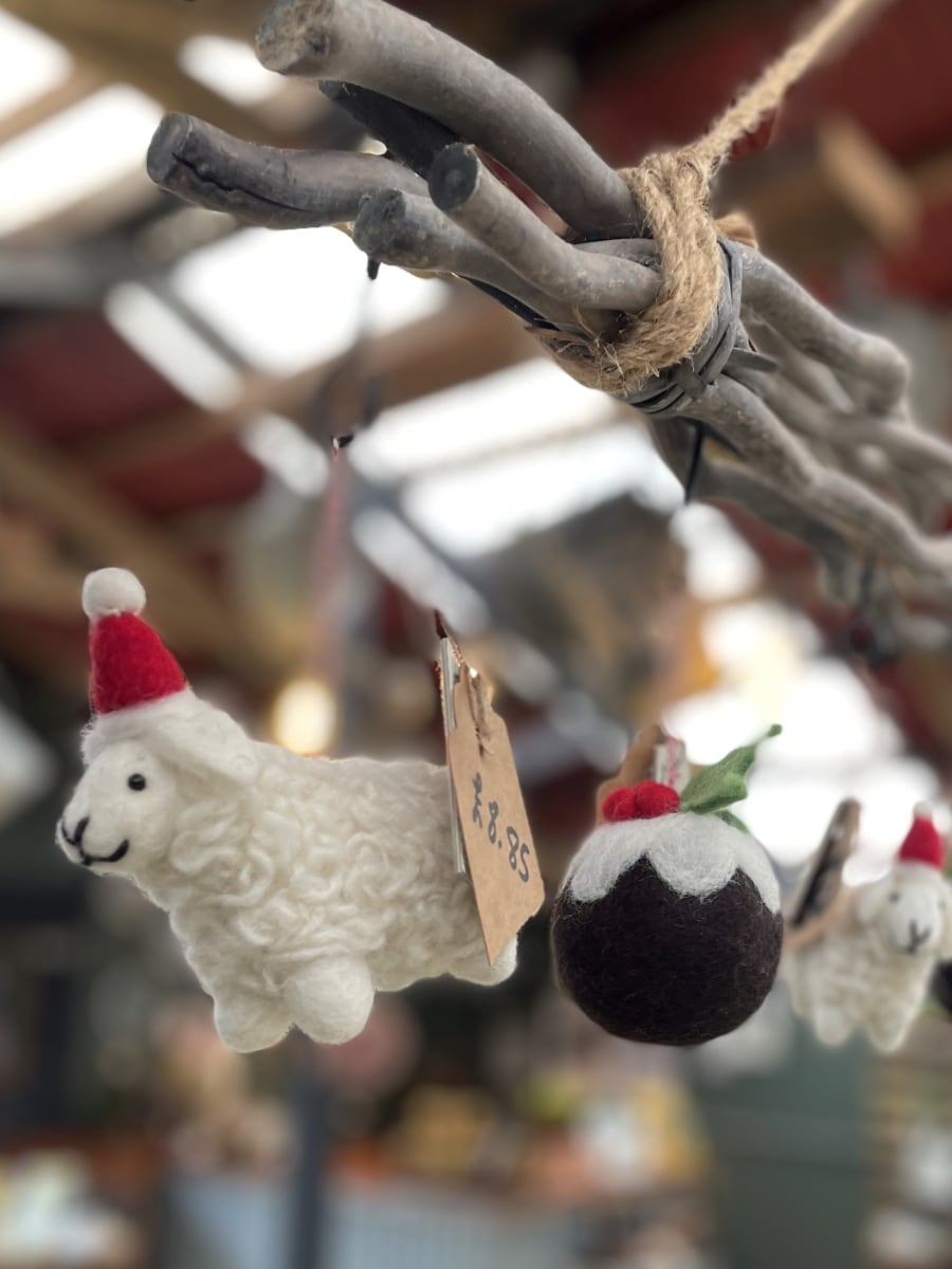 Christmas decorations hanging in The Shop.