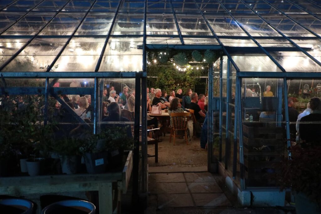 Looking into the greenhouse from outside.