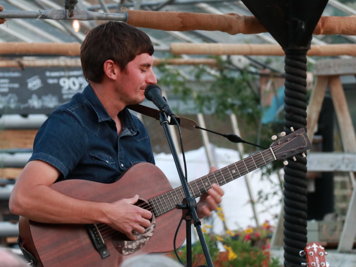 Tom Cole playing in the greenhouse at Babylon
