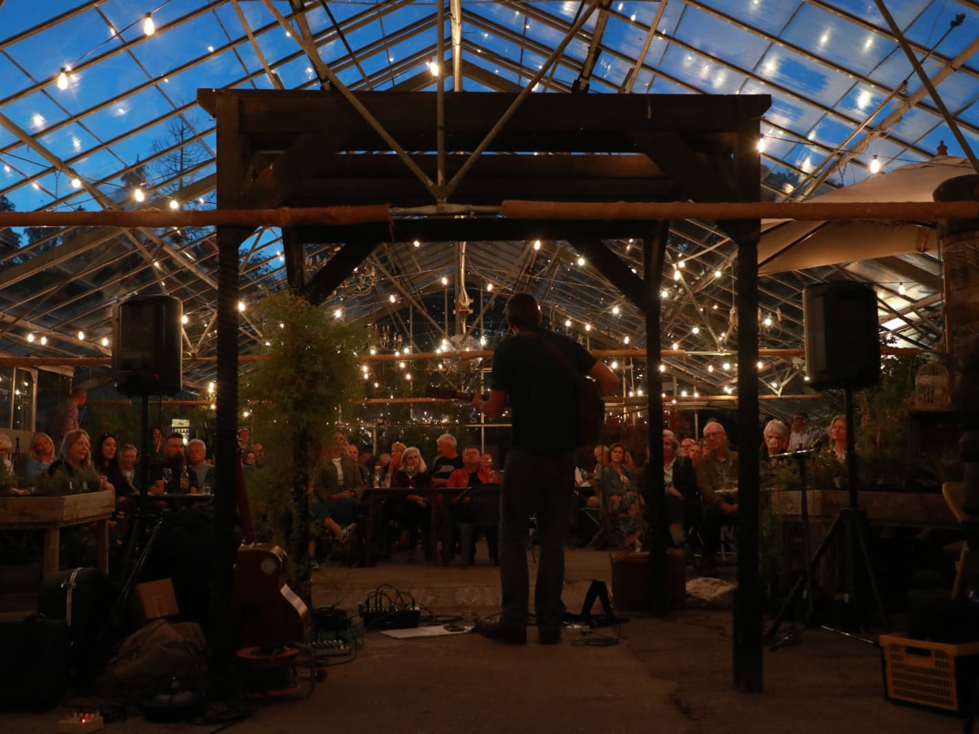 Tom Cole playing in the greenhouse at Babylon