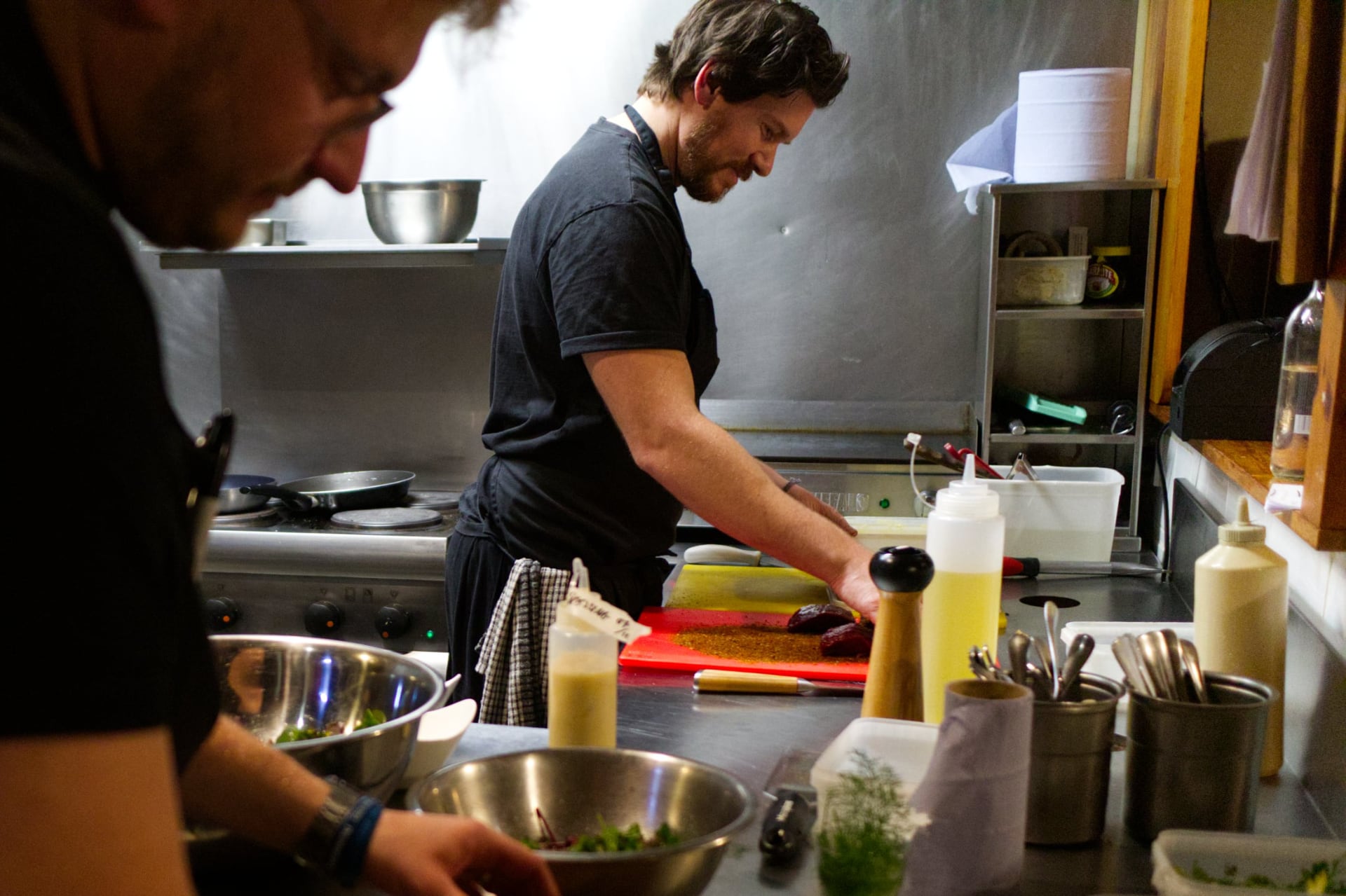 Alex and Tom cooking at the Secret Kitchen