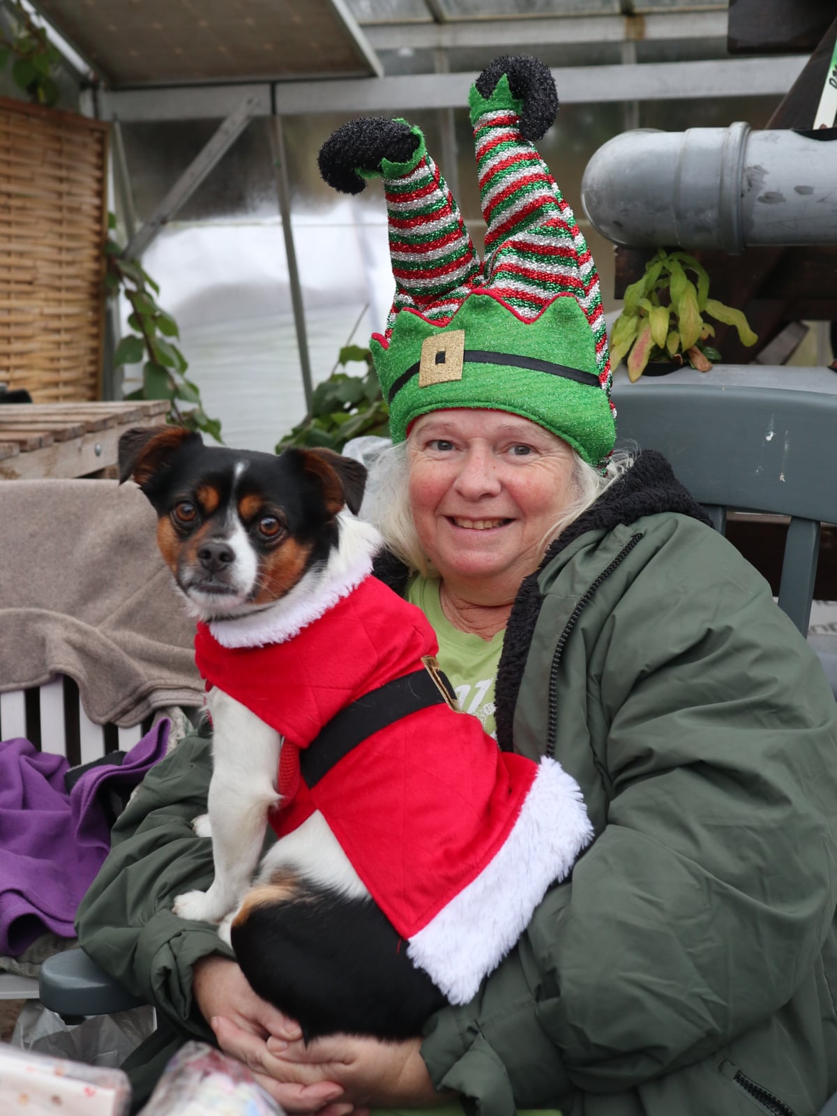 Sylvia and Sidney wearing Christmas headgear and outfits.