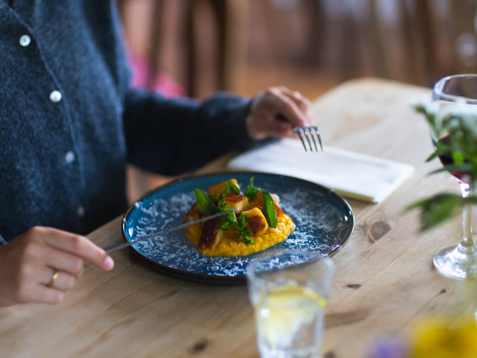 A plate of gnocchi, butternut squash and sage.