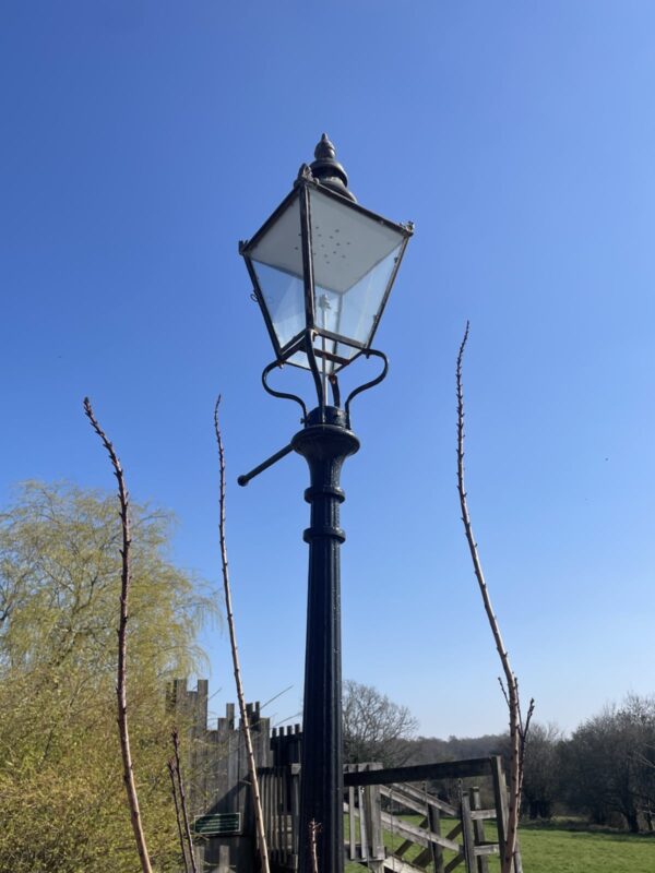 Windsor Lantern by William Suggs installed onto the post here in the Babylon entrance.
