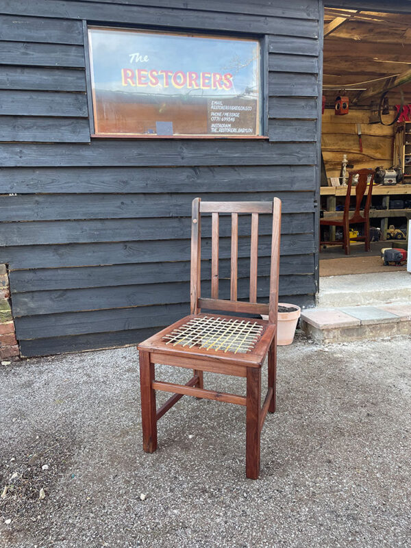Wooden chair with woven seat, repaired by The Restorers.