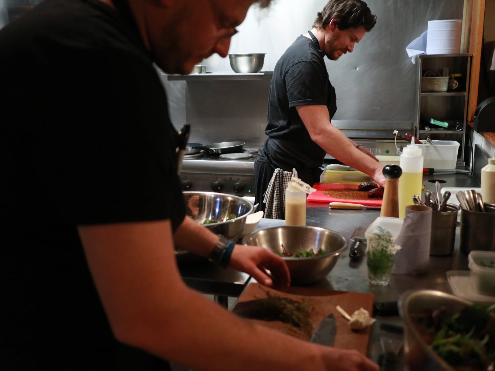 Our chefs Alex and Tom working in the kitchen.