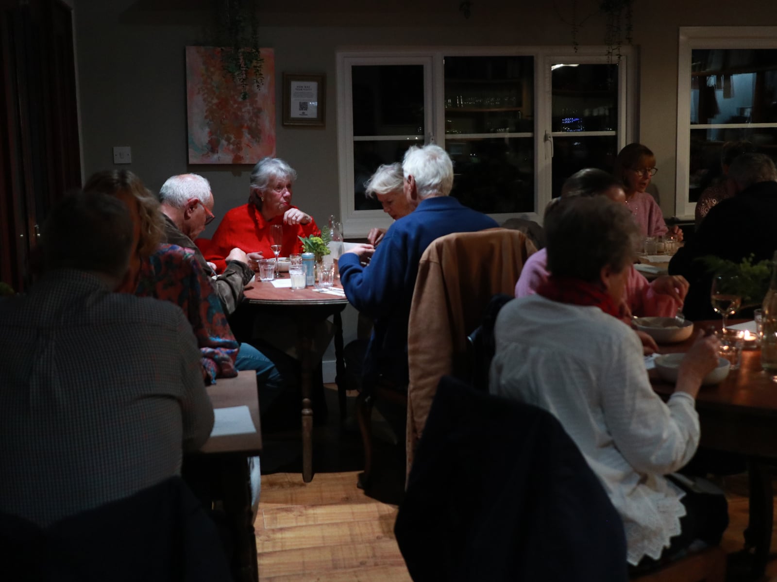 Diners seated at tables in our restaurant.